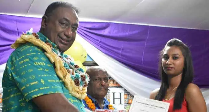 Roshmita Roshika Prasad, right, receives her award from Ministry of Youth and Sports director George Francis at Labasa Special School, March 10, 2018.  Photo: WATI TALEBULA