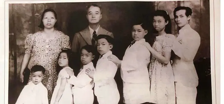 Standing at the Back: the late Mr and Mrs Ham Bing Nam. From left: The Harm Nam siblings: Edward, Rosie, Arthur, Victor, George, Annie and Ivan.