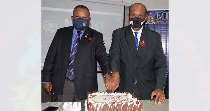 Minister for Disaster Management Inia Seruiratu and Minister for Meteorological Services Jone Usamate cutting the cake during the Disaster Media Awareness Campaign launch on October 13, 2021. Photo: Ronald Kumar