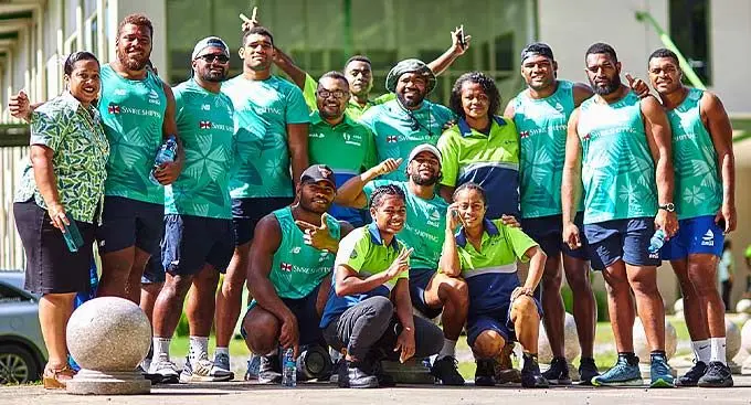 Swire Shipping Fijians Drua captain Meli Drenalagi (standing fourth from left) with teammates and Pleass Global global staff at the Kila Eco Adventure Park, Namosi on December 17, 2022. Photo: Fijian Drua Media