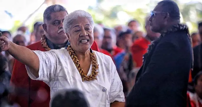 Members of the FAST party and supporters remain outside under marquees that had previously been set up for the swearing-in of Parliament today. Photo: Samoa Observer