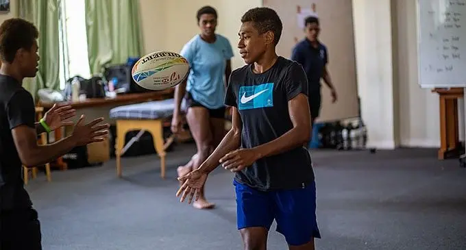 Fijiana sevens squad members halfback Reapi Ulunisau (right) and Lavena Cavuru work on their passing during their indoor training session at their Pacific Theological College camp, Suva, on January 10, 2023. Photo: Leon Lord