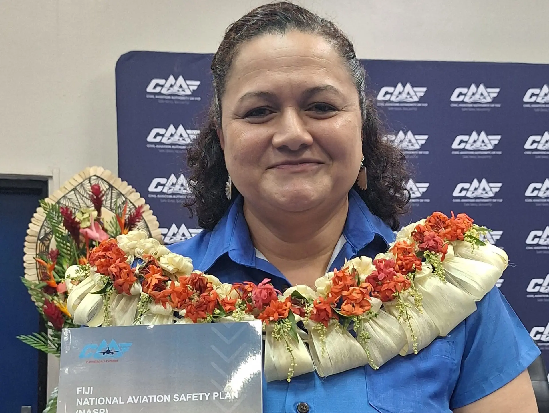 Civil Aviation Authority of Fiji (CAAF) chief executive Theresa Levestam holds the NASP. Photo: WAISEA NASOKIA