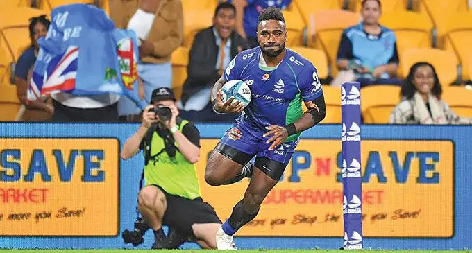 Swire Shipping Fijian Drua winger Onisi Ratave scores the first of his two tries against Brumbies at Suncorp Stadium, Brisbane, Australia, on April 9, 2022. The Drua lost 33-12. Photo: Fijian Drua