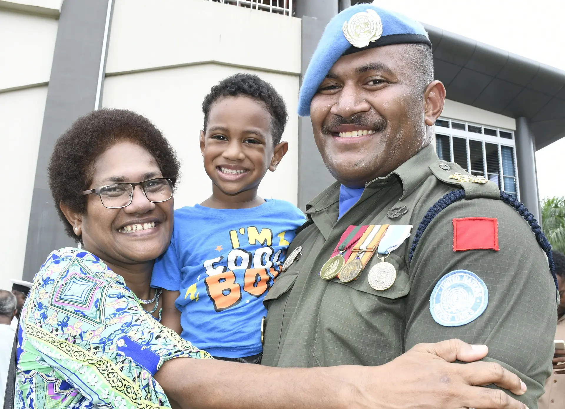 Capt. Lasarusa Nukutabu wih son Noah Nukutabu and mother Litia Nukutabu following the commemoration of the return of the first battalion Fiji infantry regiment from the UNAMI parade at Albert Park in Suva on December 22, 2025. Photo: Ronald Kumar. 