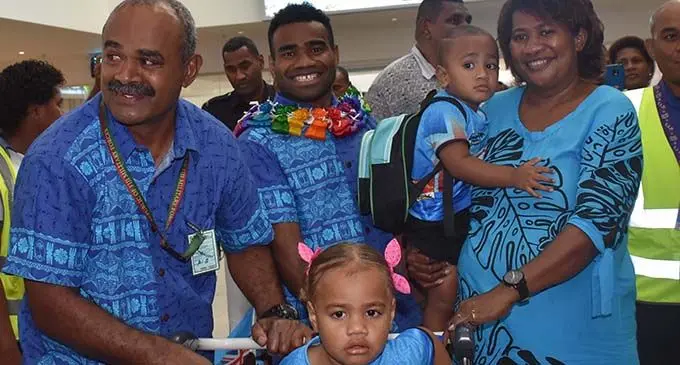 Fiji Airways Fijian 7s star halfback Seremaia (Jerry) Tuwai with mum Seruwaia and family members at Nadi International Airport on June 5, 2019. Photo: Waisea Nasokia  