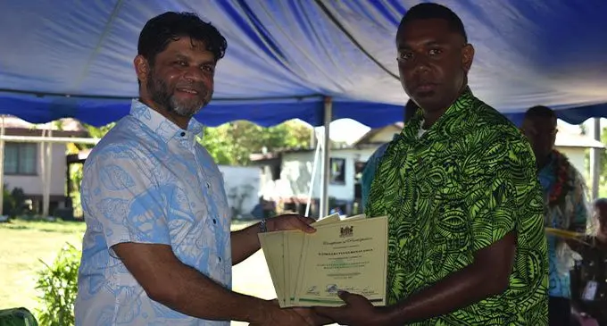 Ceva Lutu receiving his certificate from the Attorney-General and Minister for Economy, Aiyaz Sayed-Khaiyum at Nadi District  School on July 23, 2022. Photo: Nicolette Chambers