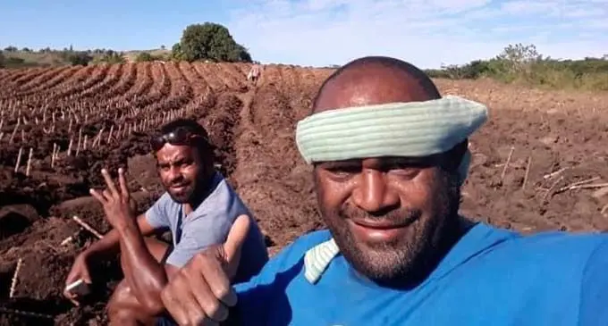 Api Naevo (right) at his farm in Nadi. Photo; Waisea Nasokia