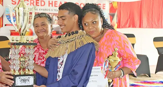 Sacred Heart College Dux Chance Wong with mum Penina Waqatabu at Sacred Heart College on December 4, 2024. Photo: Jone Salusalu