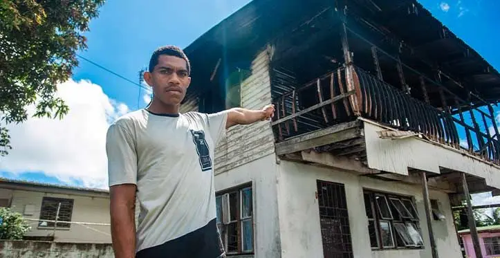 Sailosi Berwick at the scene of the fire at Balabala Crescent, Newtown, on November 19, 2023. Photo: Leon Lord