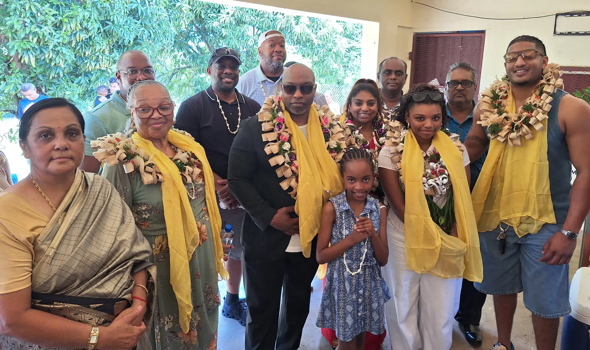 (Third from left) Founder of KEEP Foundation Ray Pressley, wife Ranjlene Pressley, daughter Emmani, son Kiji, with the foundation team and Hindu Maha Sabha school management board. 