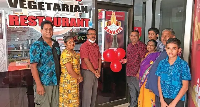 From left: Sam Mudaliar, Monika Sharma, Savilla House owner Kishor Kumar, Rohit Sharma, Ritanch, Kamta Prasad, Rambha Wati and Satyanch during the opening of Rani’s Vegetarian Restaurant at Savilla House in Labasa on February 12, 2022.   Photo: Shratika Naidu