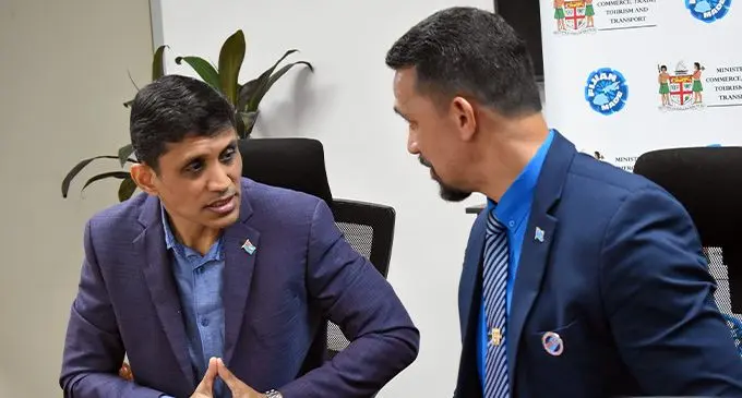Permanent Secretary for Commerce and Trade, Shaheen Ali, with Permanent Secretary for Fisheries, Pene Nonu, in discussions over the commencement of harvest and trade of beche-de-mer.