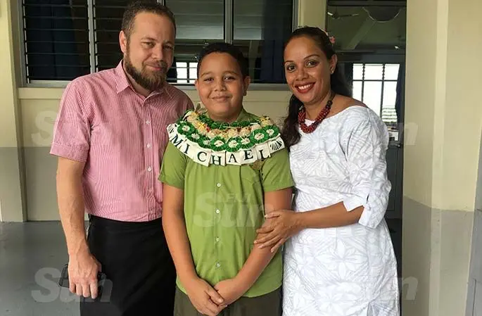 Michael Kennedy with his parents.