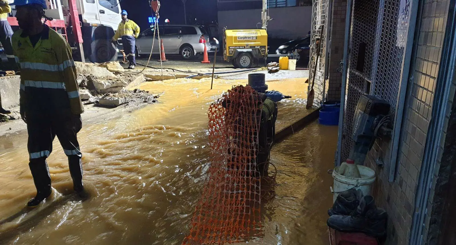 Water Authority technicians repair the valve causing massive water problems from Nasinu and Nausori areas. Photo: Shalveen Chand