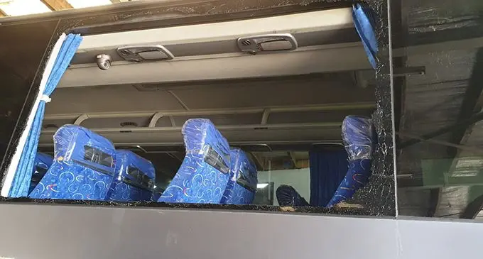 Results of the bus window which was stoned.