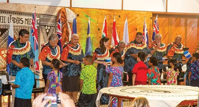 Students of Yat-Sen and Draiba primary schools present the Pacific Islands Forum leaders a copy each of the 2050 Strategy for the Blue Pacific Continent at the Pacific Islands Forum Secretariat headquarters in Suva on July 14, 2022. Photo: Leon lord