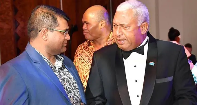 Prime Minister Voreqe Bainimarama in dicussions with Reserve Bank of Fiji Governor Ariff Ali at the Prime Minister’s International Business Awards night at Sofitel Fiji Resort and Spa on November 24, 2018.  Photo: DEPTFO News