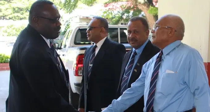 Fiji Police Force Acting Deputy Commissioner of Police Rusiate Tudravu (left), meeting retired Police officers during the interfaith Western Police service at Churchill Park in Lautoka on February 25, 2018. Photo: Police Media Cell