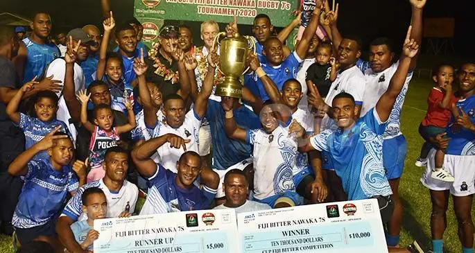 POLICE DOMINATE NAWAKA 7s... Members of the Police Blue and Police White 7s teams celebrate with officials, major sponsors, fans, family and other stakeholders when they were crowned champion and runner-up after the Cup final of the 33rd Fiji Bitter Nawaka 7s at Nadi’s Prince Charles Park on February 22, 2020. Police Blue beat Police White 31-19, successfully defending their title. Photo: Waisea Nasokia