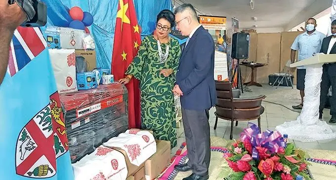 Chinese Ambassador to Fiji Qian Bo speaking with the Assistant Minister for Women, Children, and Poverty Alleviation Veena Bhatnagar during the handover ceremony of the donated items by All-China Women’s Federation at Ministry of Women, Children, and Poverty Alleviation warehouse in Vatuwaqa on December 14, 2021.  Photo: Ashna Kumar