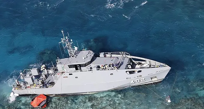 Aerial view of RFNS Puamau on a reef off Fulaga Island. Photo: RFMF Naval Division