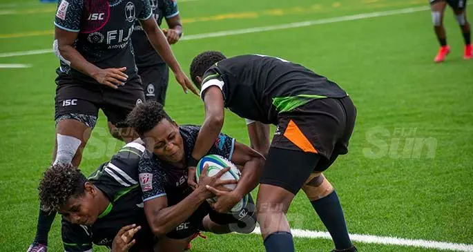 Mount Camel player Ema Adivitaloga (withball) against Hope rugby team during the Mobile Upraising Sevens tournament in Pacific Habour on the 5th February 2021.. Photo: Leon Lord