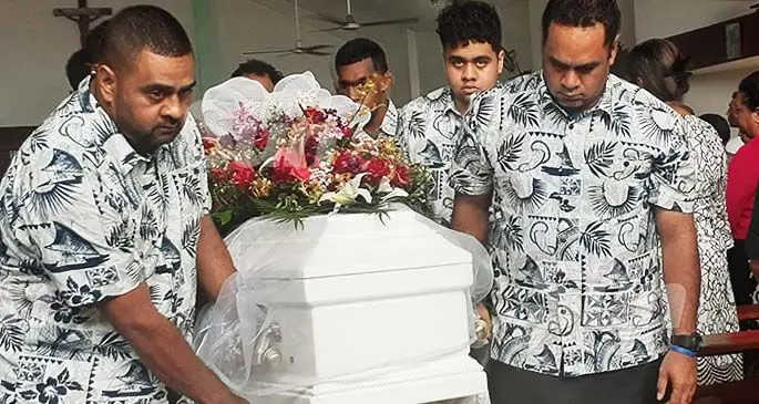 The children and grandchildren of the late Rosylene Rodan rolling her casket out of churh after the funeral service on January 18, 2019. Photo:Simione Haravanua
