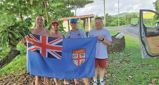 From left: Northern Fitness Gym member, Craig Lee, Brent Lee, Michelle Anderson and Adam Peel who is part of the support team holding the Fiji flag in Rakiraki last week. Photo: Northern Fitness Gym