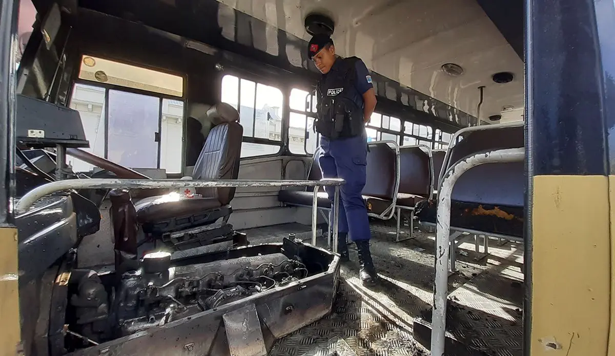 A Police officer inspects the bus. Photo: Shalveen Chand