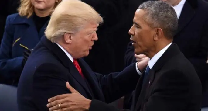 Photo taken on Jan. 20, 2017 shows U.S. President Donald Trump (L, front) being greeted by former U.S. President Barack Obama after delivering his inaugural address during the presidential inauguration ceremony at the Capitol in Washington, D.C., the United States. (Xinhua/Yin Bogu)