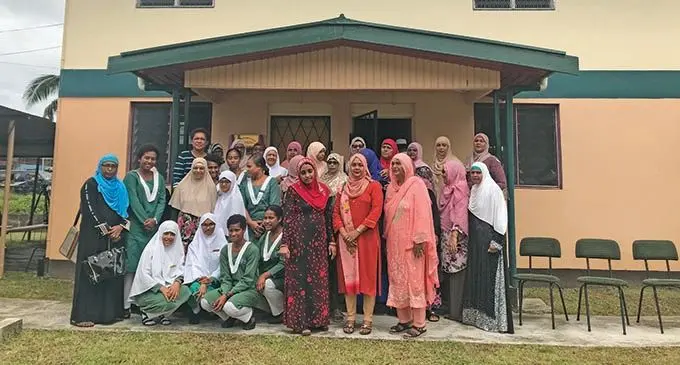 Minister for Women, Children and Poverty Alleviation, Mereseini Vuniwaqa with students and women from the Fiji Muslim Women’s League and the residents of the home in Koronivia.  Photo: Kelera Sovasiga