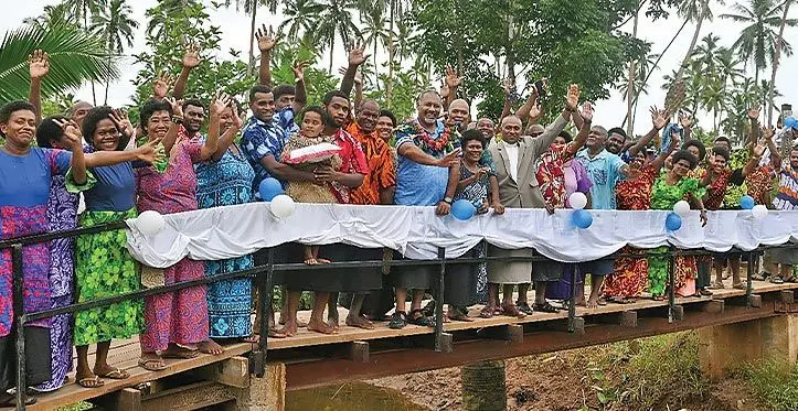 Minister of Rural, Maritime Development and Disaster Management Sakiasi Ditoka (middle) with the villagers during the opening of the newly constructed foot crossing in Cakaudrove on March 24, 2023. Photo: Ministry of Rural, Maritime Development and Disaster Management