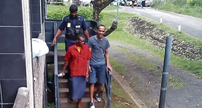 The accused Eparama Bainivula (wearing red).