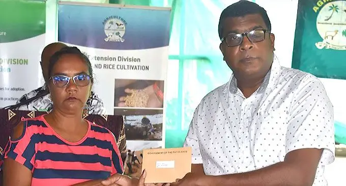 Minister for Agriculture, Mahendra Reddy, presented offer letters to a number of farmners in Nadi, on April 28,2022. 