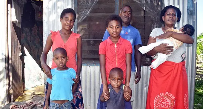 Pita Volavola (standing back) with family members (middle row, from left) Katarina Volavola, Ulamila Volavola, with Akisi Volavola (holding the baby) and (front from left): Josua Volavola and Erami Volavola.  Photo: Mereleki Nai