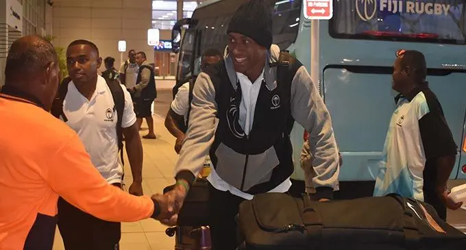 Fiji Airways Fijian 7s forward Joseva Talacolo meets a fan at Nadi International Airport, this morning. Photo: Waisea Nasokia