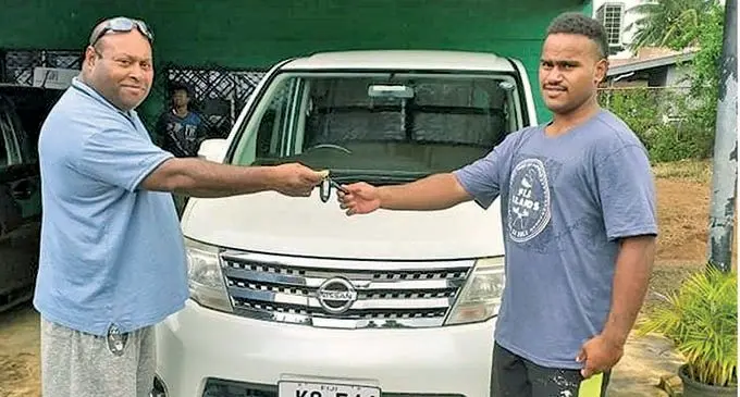 Jone Baravilala Snr (left) and Jone Baravilala Jnr with their new family vehicle.  
