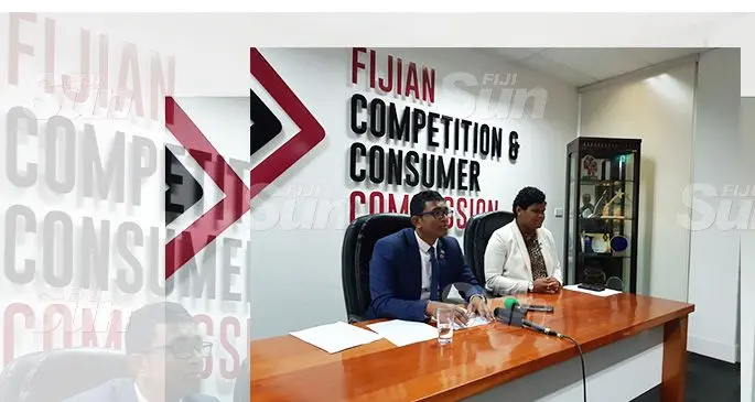 Fijian Competition and Consumer Commission chief executive Joel Abraham (left) and General Manager Operations Senikavika Jiuta making the announcements at the FCCC Headquarters in Suva on September 17, 2019. Photo: Shalveen Chand