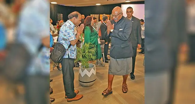 Prime Minister Sitiveni Rabuka greeting delegation members from India at the 12th World Hindi Conference at the Denarau Convention Centre on February 15, 2023. Photo: Fiji Government