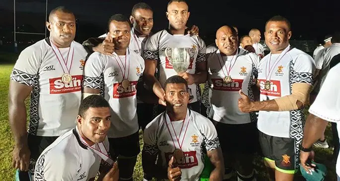 Republic of the Fiji Military Forces rugby team with captain Sireli Ledua (standing fifth from left) after retaining the International Defence Rugby Competition trophy in Tokyo, Japan on September 23, 2019. Photo: Osea Natuva/RFMF
