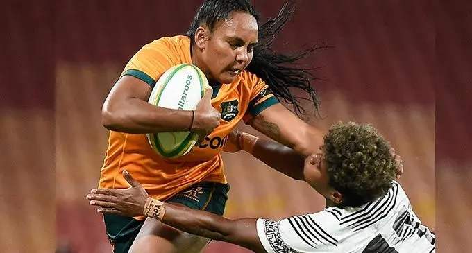 Rooster Chicken Fijiana XVs winger Vitalina Naikore tackles Wallaroos Mahalia Murphy during their Test clash at Suncorp Stadium in Brisbane, Australia, on May 6, 2022. Photo: Rugby Australia