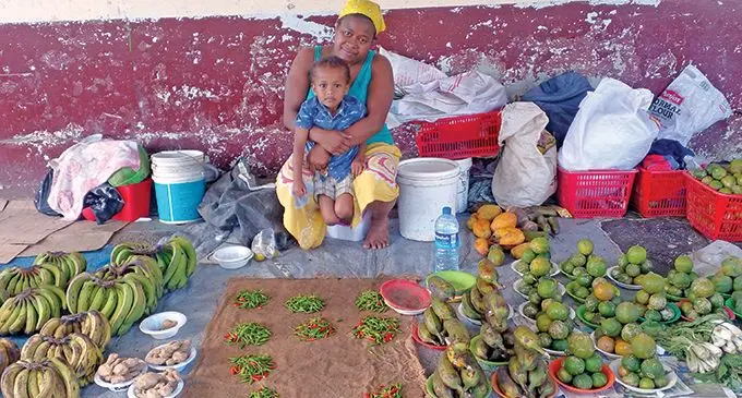 Mary Elizabeth Fong with her second youngest son Salimoni Tabua at the Lautoka Market on May 8,2022.  Photo: Salote Qalubau