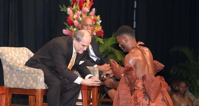 Asia-Pacific Broadcasting Union General Secretary Javad Mottagi receives a bowl of yaqona from a young man from the vanua of Nadi who performed the official traditional welcome ceremony at the 4th Asia Pacific (ABU) Media Summit on Climate Change and Disaster Risk Reduction. Photo: Office of Attorney-General