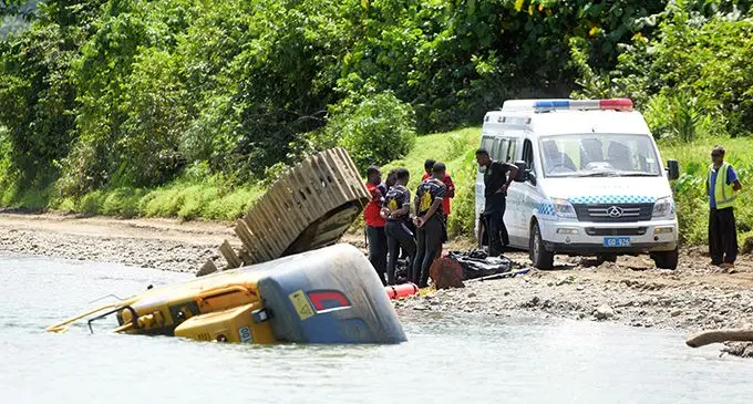 Tomasi Cagilaba is placed onto the tray of a Police truck after it was found in the digger at Navua River along Waiyanitu on March 31, 2023. Photo: Ronald Kumar