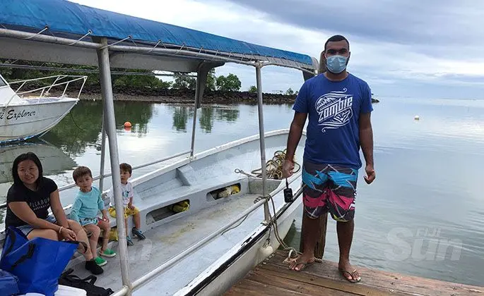 Guests at the Waidroka Bay Resort with Deputy Resort manager Ilai Nakia. Photo: Jennis Naidu