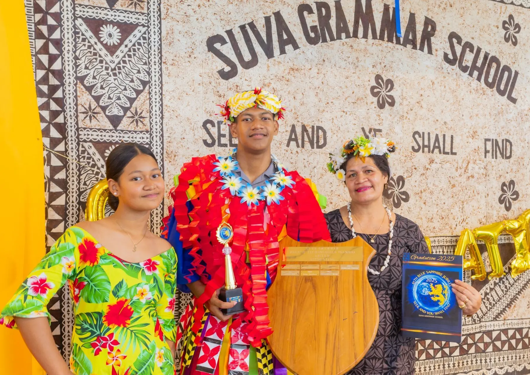 From left, graduate's sister Selepa Vaea, graduate - Taukimafi Vaea, and his mother Tautua Vaea during the school's graduation ceremony on November 12, 2025. 
