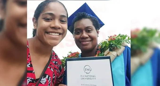 Kalesi Bakani (right) during her graduation.