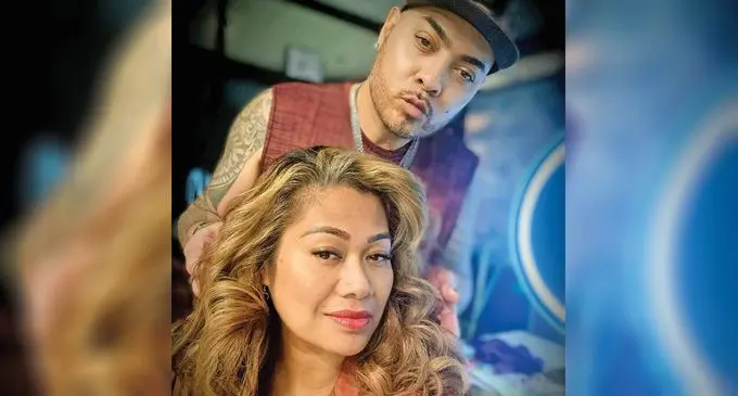 Stanley Morrell attending to a client’s hair and make-up. Photo: Stanley Morell