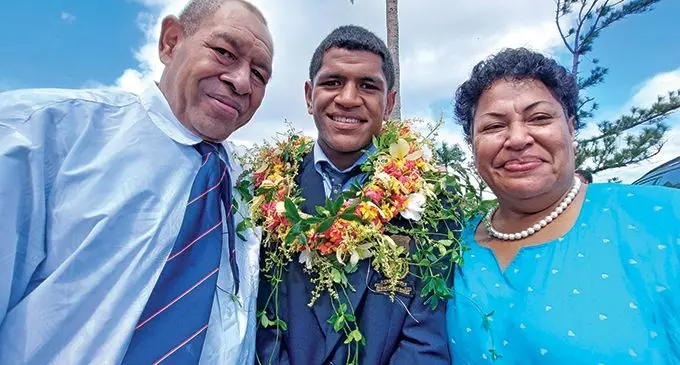 QVS Head Boy Tomasi Seru (jnr) with his parents Tomasi Seru and Adi Mere Cinavilakeba.  Photo: Wati Talebula-Nuku